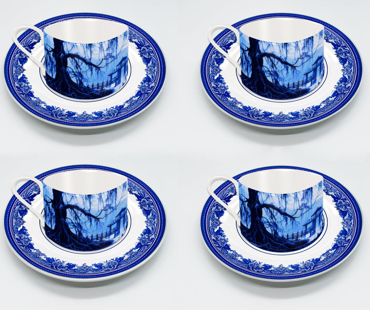 Set of 4 Fine China 8 oz. Cups with matching rimmed 6.25" saucers.  The cups have the landscape image wrapped around the cup.